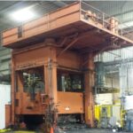 MFG View of machine in warehouse - orange color